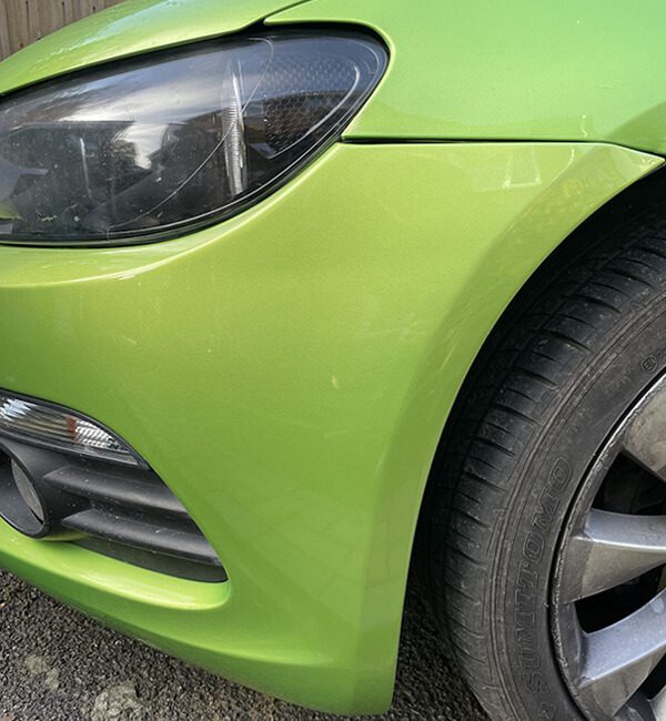 green car after repair