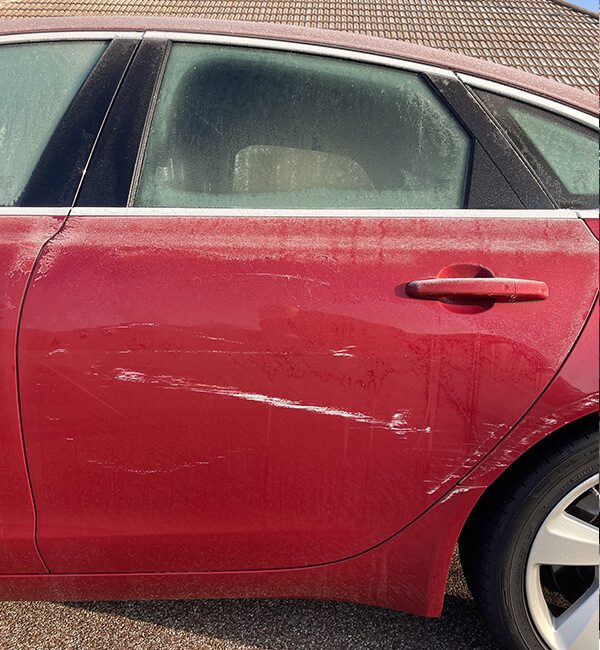 red car before repair