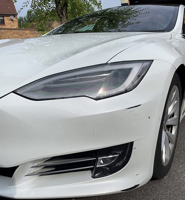 tesla car before repair